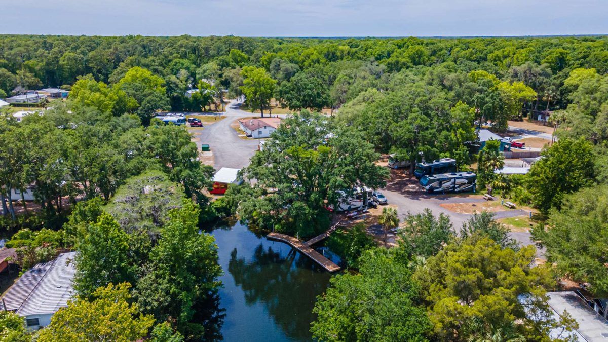 Aerial view of Seven Sisters Campground on the canal, surrounded by oaks